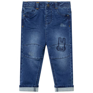 Jean effet used avec broderies contrastées 