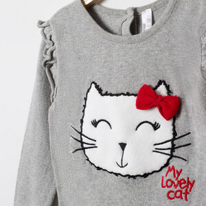 Pull en tricot esprit marin à noeuds brodés et volants 