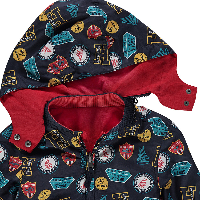 Αντιανεμικό μπουφάν διπλής όψης με αφαιρούμενη κουκούλα 