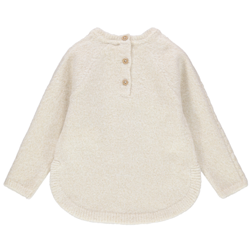 Pull en tricot torsadé à pans arrondis 