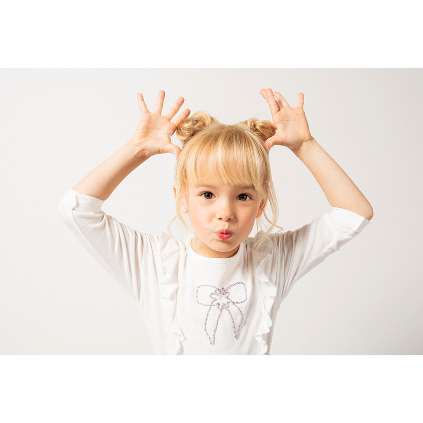 Μακρυντομάνικη ζέρσεϊ μπλούζα με βολάν και κεντημένο φιόγκο 