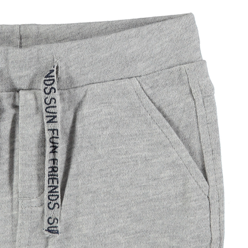 Μονόχρωμη φανελένια βερμούδα με εμπριμέ κορδόνια 