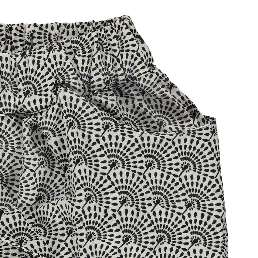 Άνετο παντελόνι με γεωμετρικό μοτίβο σε όλη την επιφάνεια 