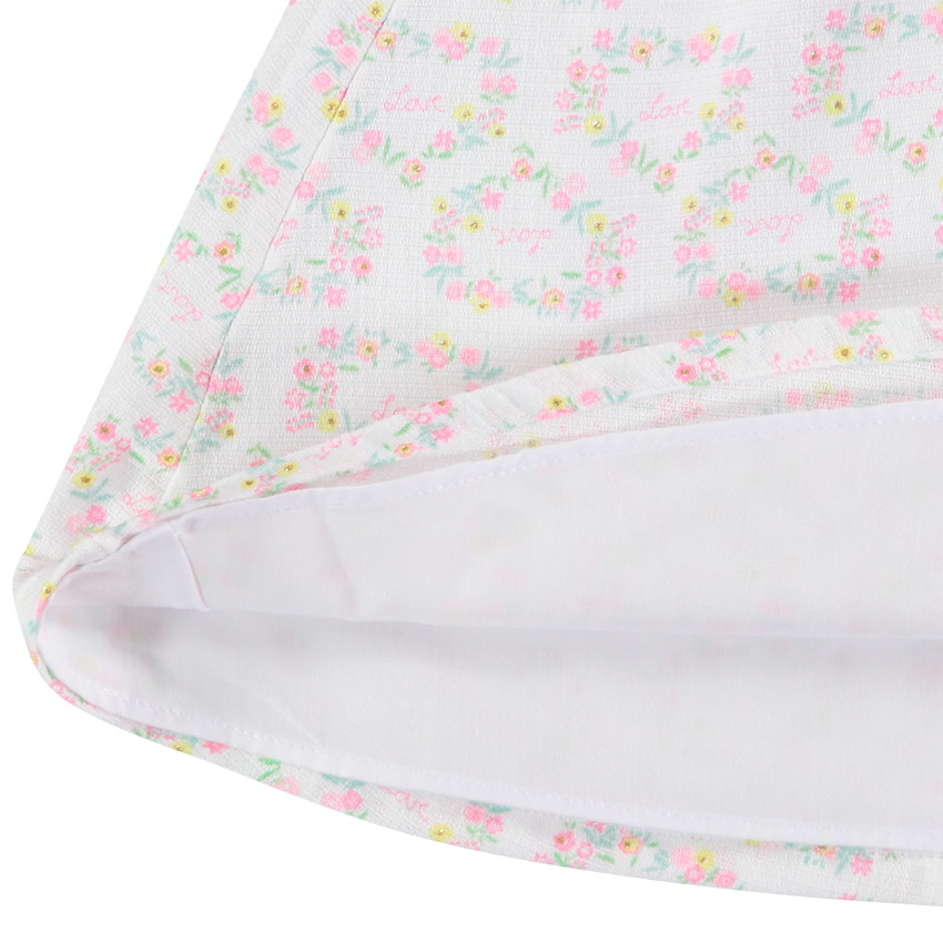 Σετ με λουλουδάτο φόρεμα και ριγέ βρακάκι. 