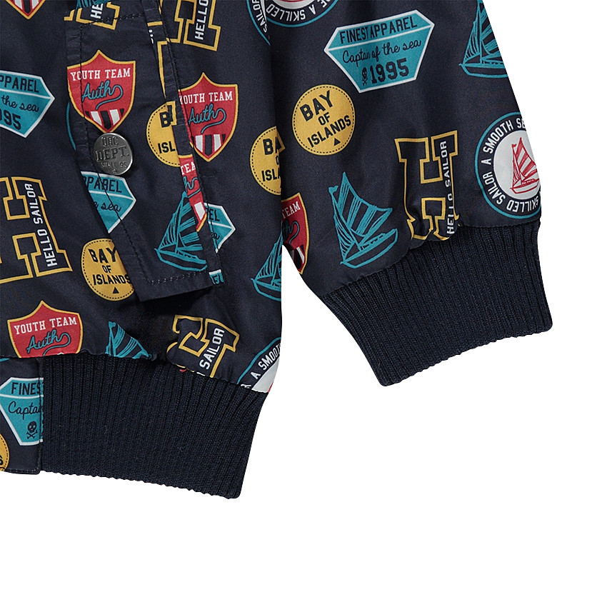 Αντιανεμικό μπουφάν διπλής όψης με αφαιρούμενη κουκούλα 