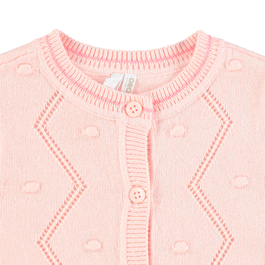 Πλεκτή ζακέτα με φουντίτσες και τελειώματα σε κάθετη ριμπ ύφανση 