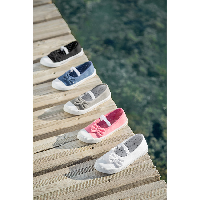 Υφασμάτινα μαλακά παπουτσάκια με λάστιχο και φιόγκο 