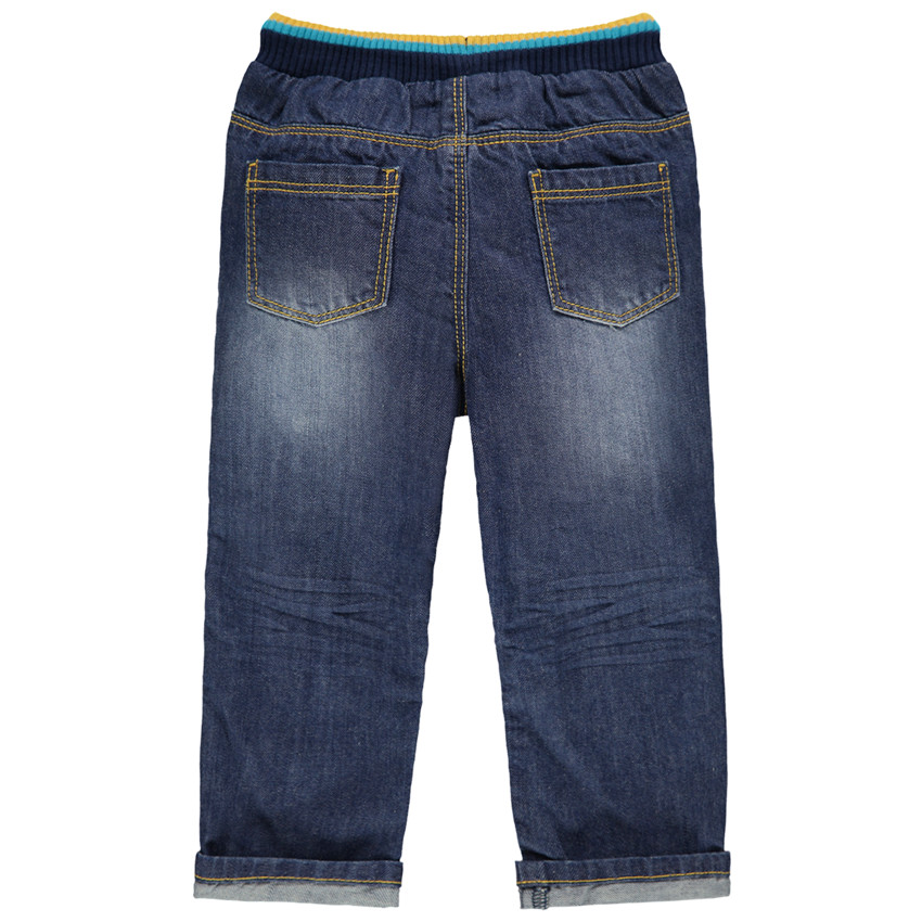 Τζιν με used όψη, λάστιχο στη μέση και απλικέ σήματα 