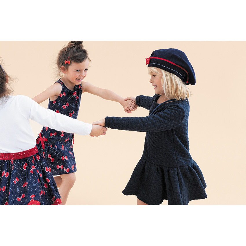 Πλεκτός μπερές με φιόγκο και φουντίτσα 