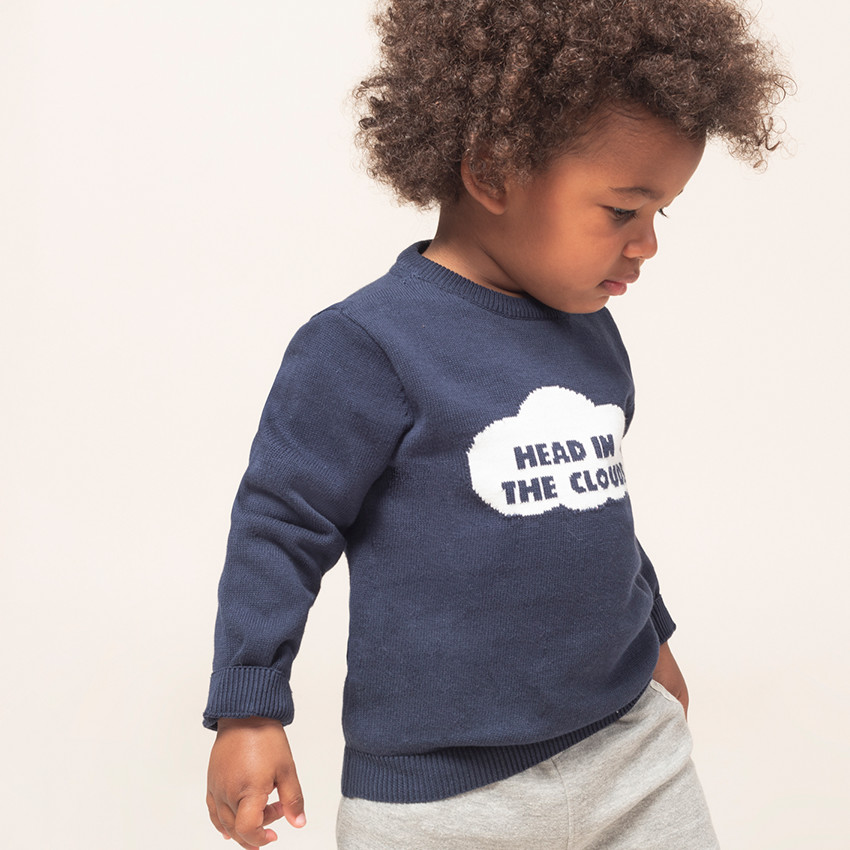 Πλεκτό πουλόβερ με διακοσμητικά στοιχεία μπροστά και άνοιγμα στην πλάτη 