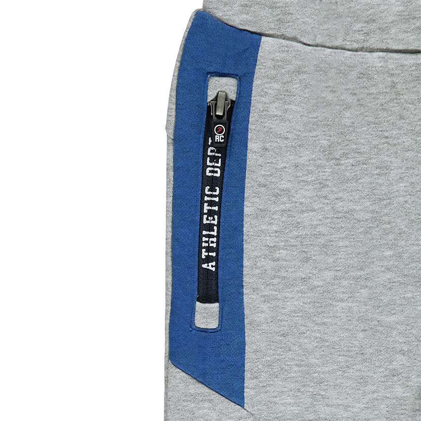 Παντελόνι φόρεμας από φανέλα με τσέπες με φερμουάρ που κάνουν αντίθεση 