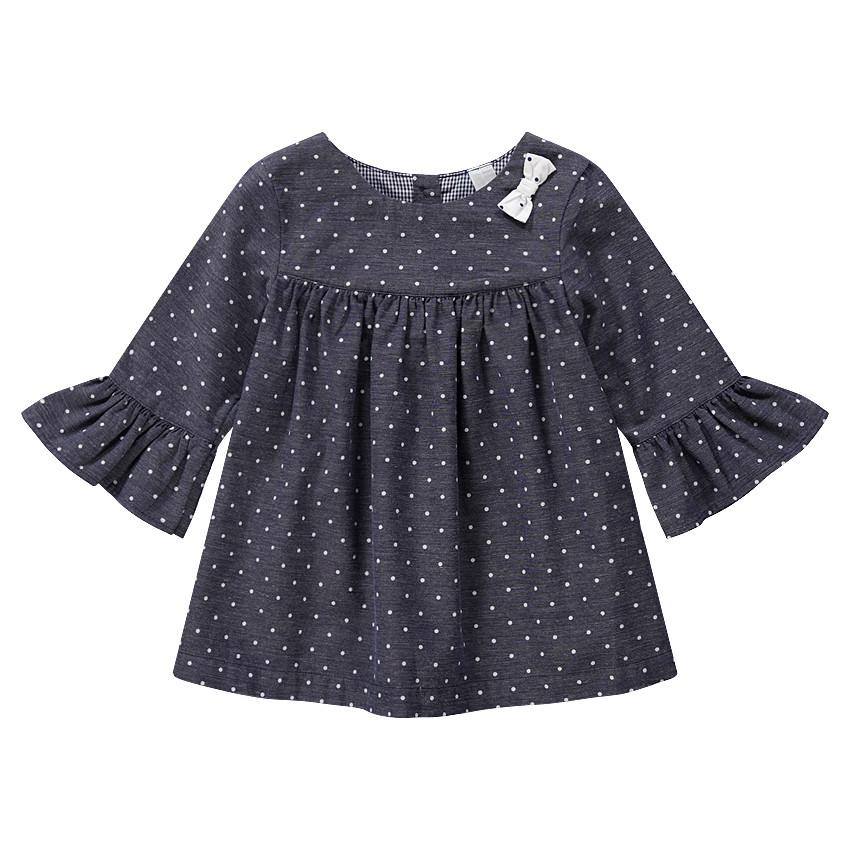 Τουνίκ με μανίκια με βολάν και πουά μοτίβο. 